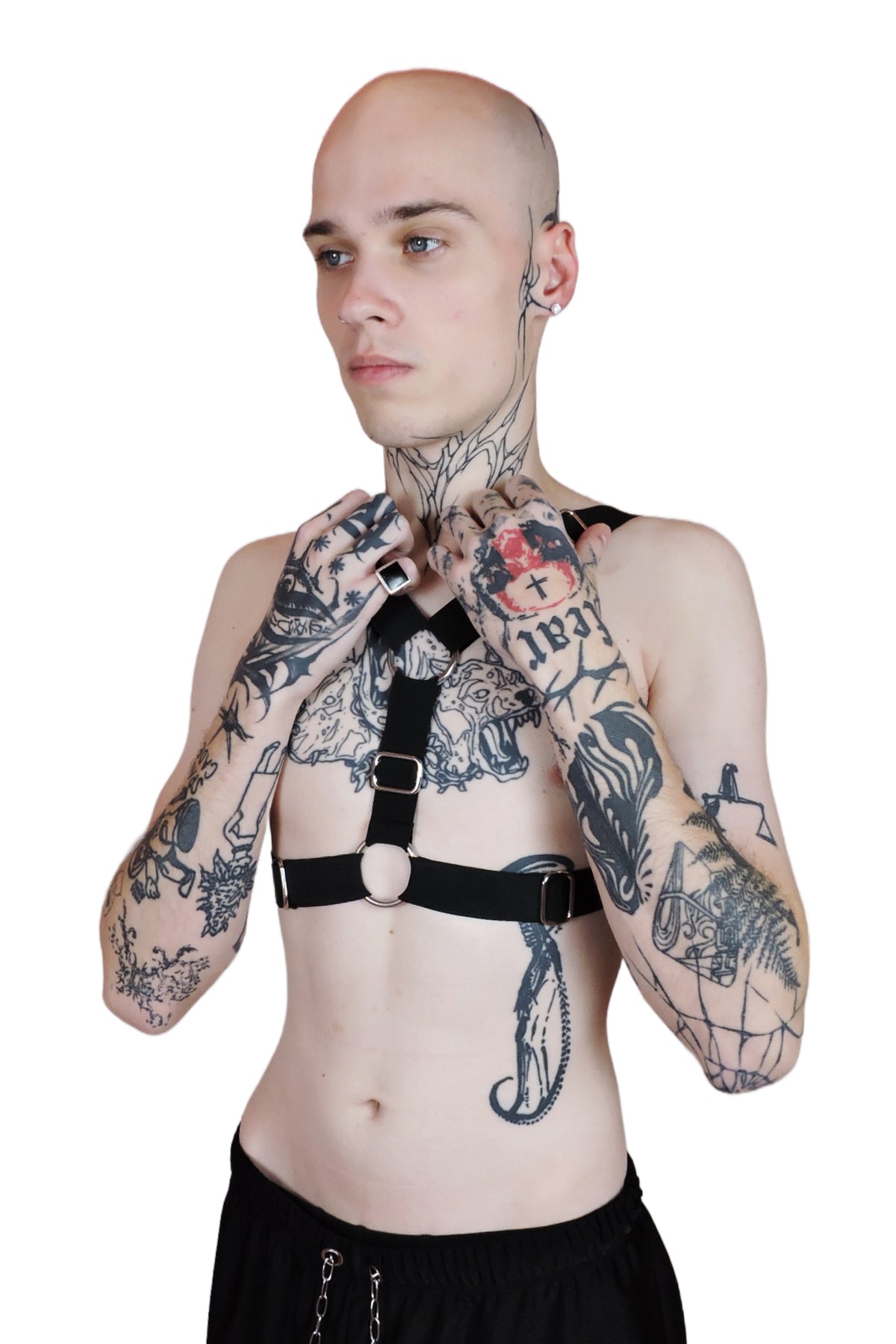 Adjustable men's harness designed to be worn two ways, with bold straps and durable construction for rave wear.