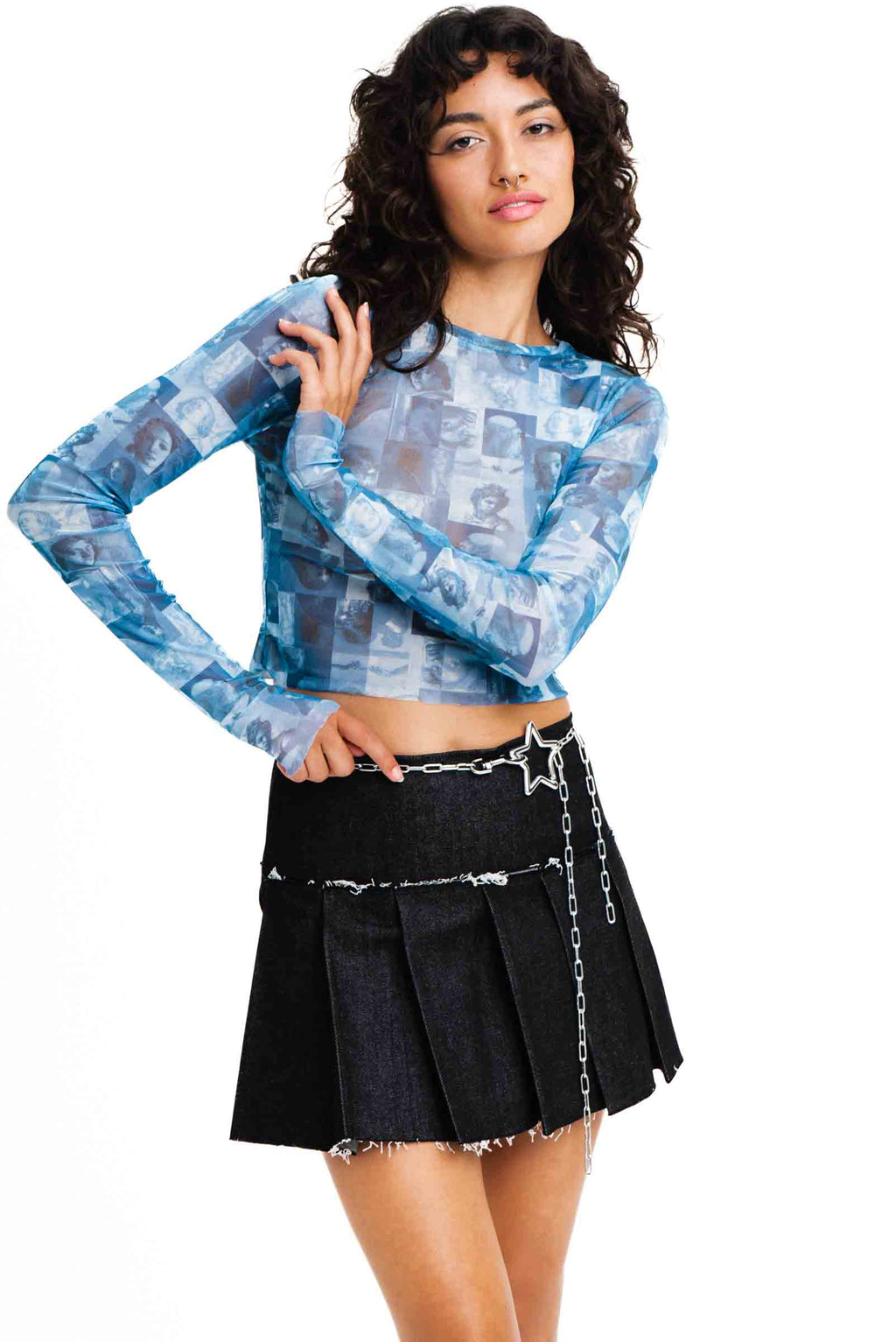 Silver chain belt with star shaped closure.