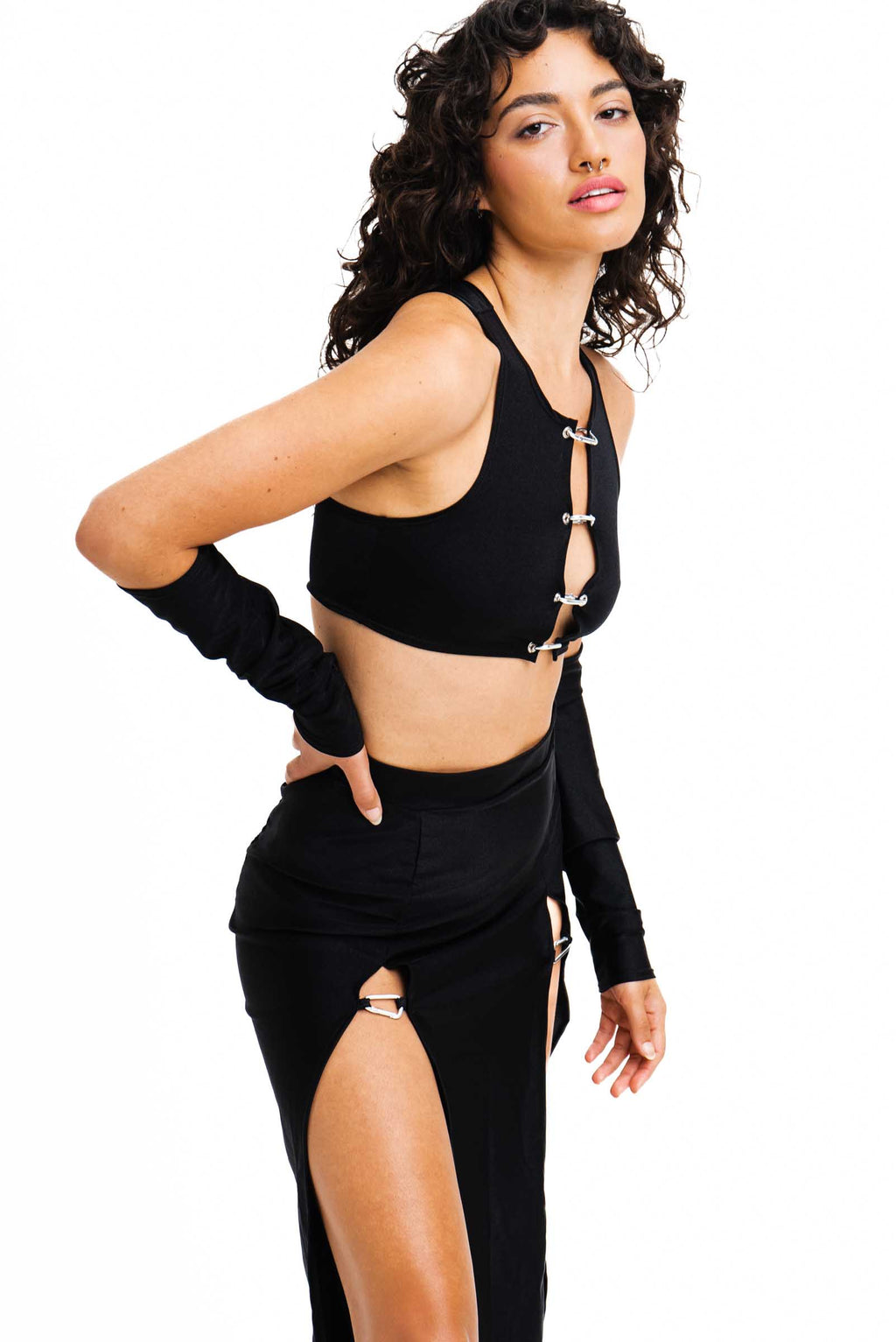 Black cropped top with silver carabiner closures.