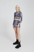 Light blue cheetah-print mesh top on a white background, fitted silhouette with sheer stretchy fabric.