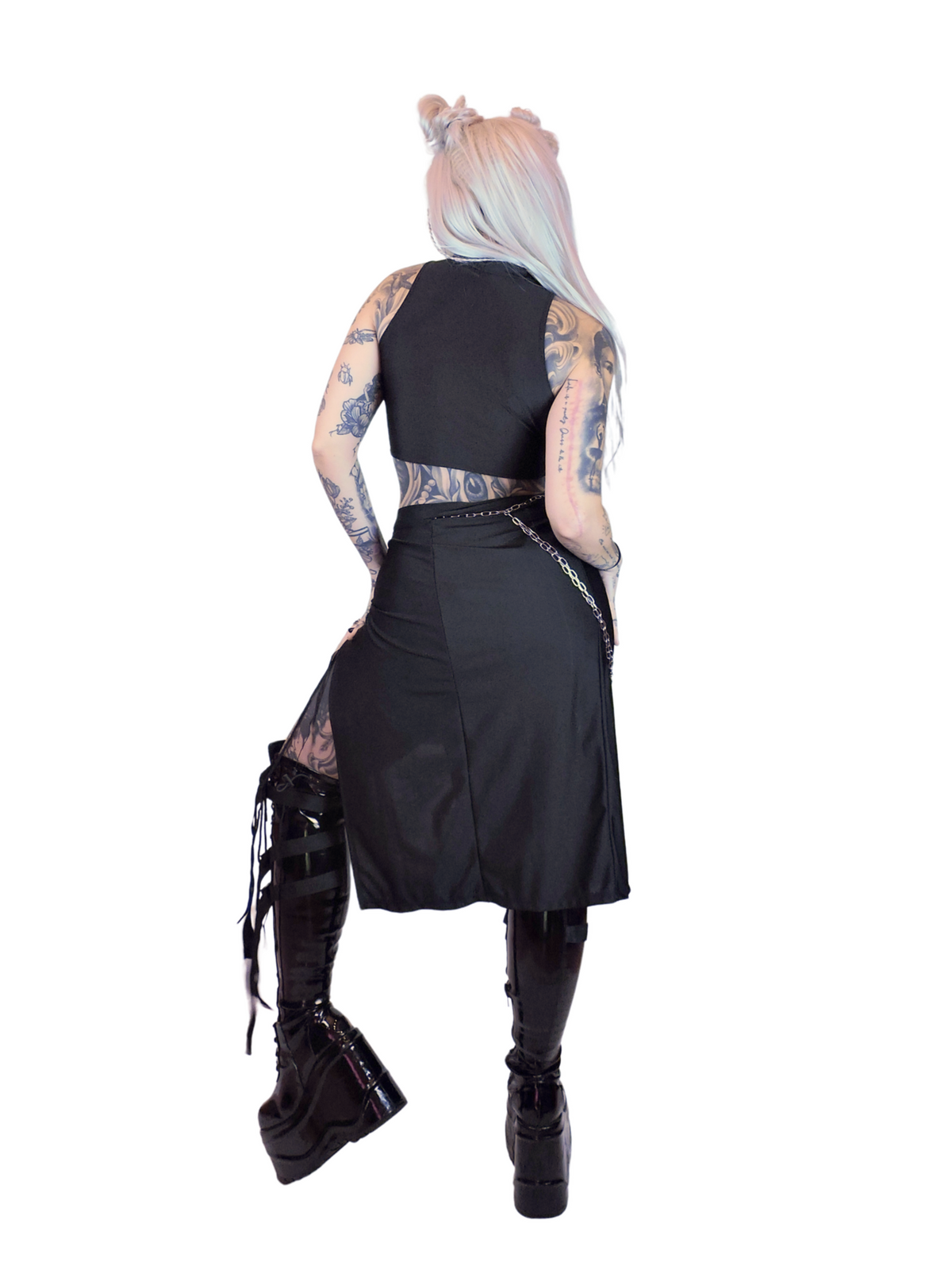 Alternative black clubwear crop top featuring a front cut-out and metal carabiner fastenings, handmade in Berlin.