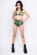 Neon green and black snake print short shorts.