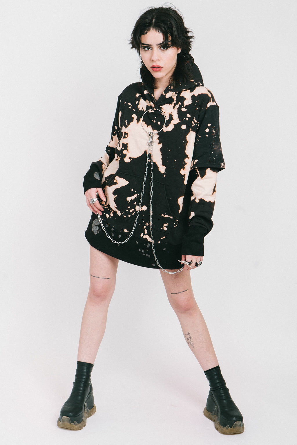 Black bleached hoodie with silver chains and a o-ring detail.