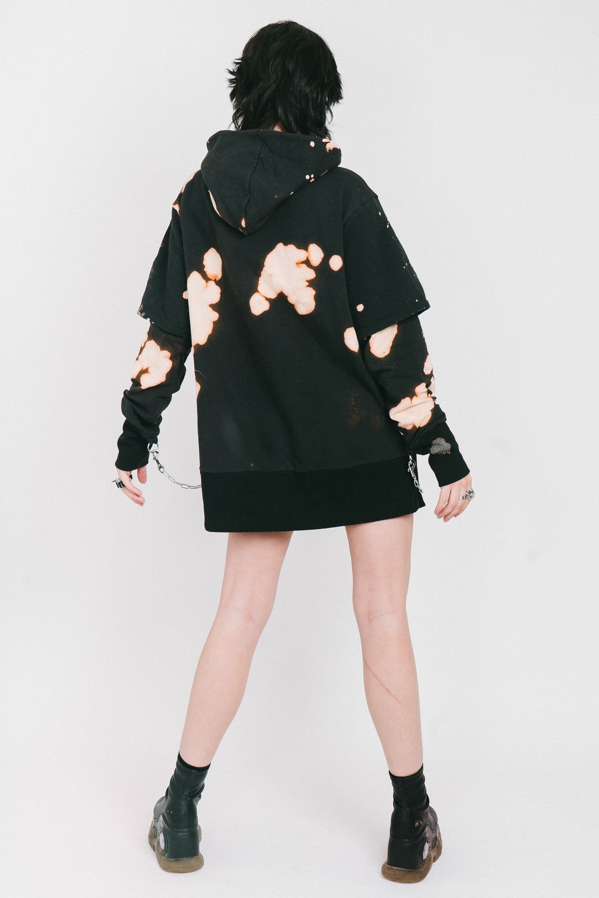 Black bleached hoodie with silver chains and a o-ring detail.