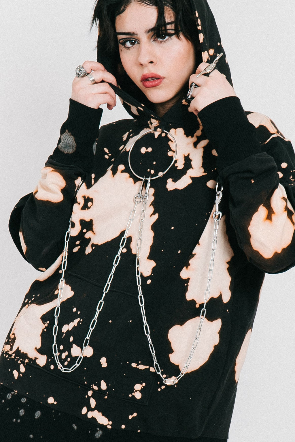 Black bleached hoodie with silver chains and a o-ring detail.