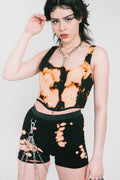 Tight black and bleached cotton short with silver chain hardware.