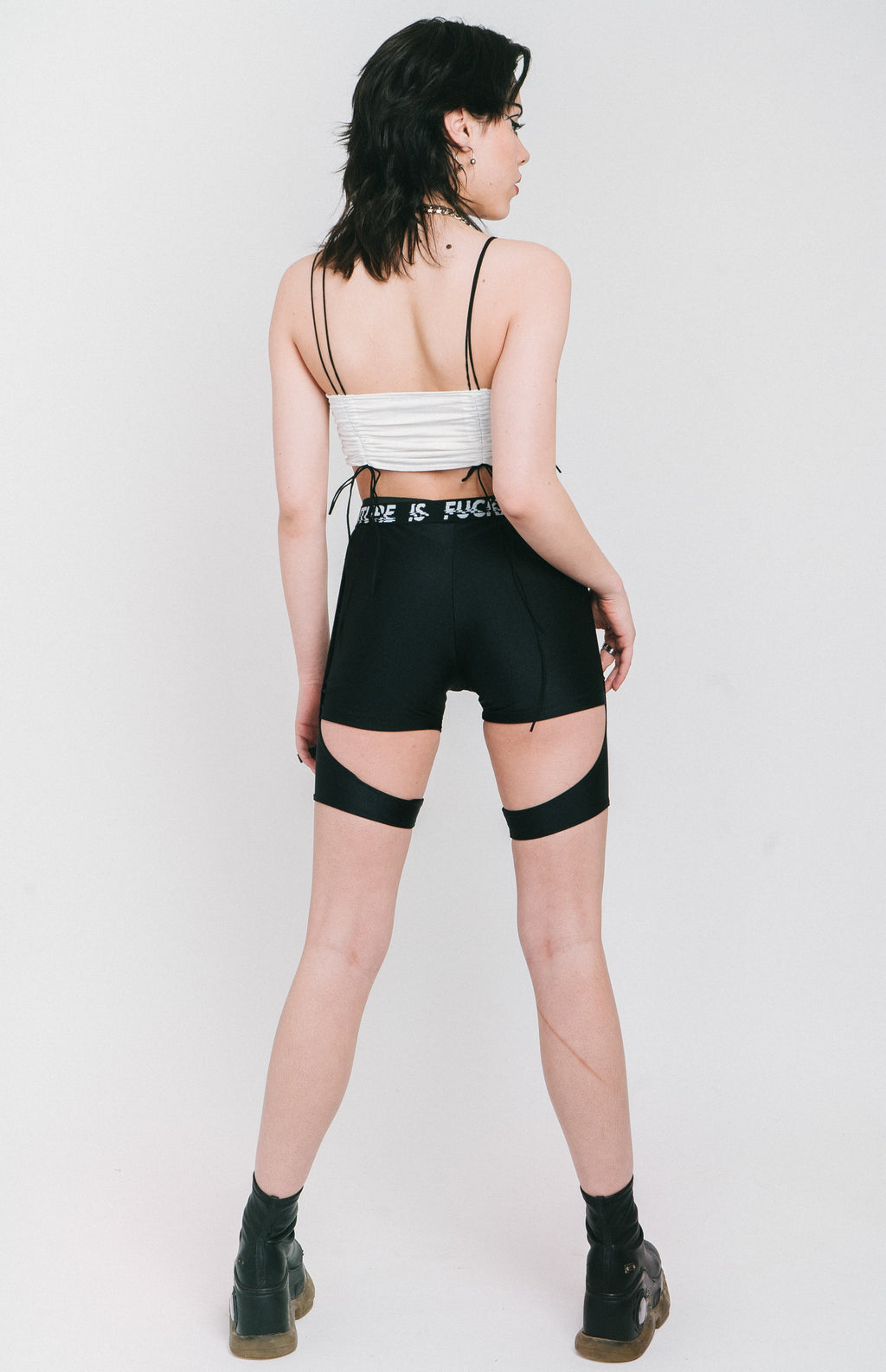 Layered strappy shorts in the "Lara Croft" style made out of black fabric