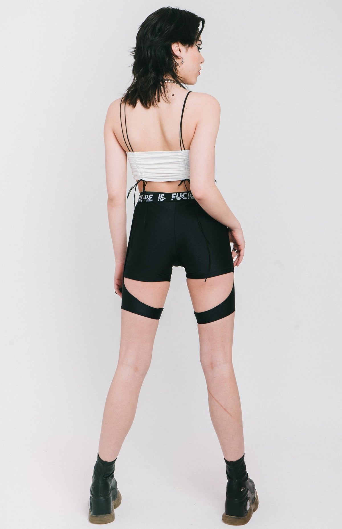 Layered strappy shorts in the "Lara Croft" style made out of black fabric