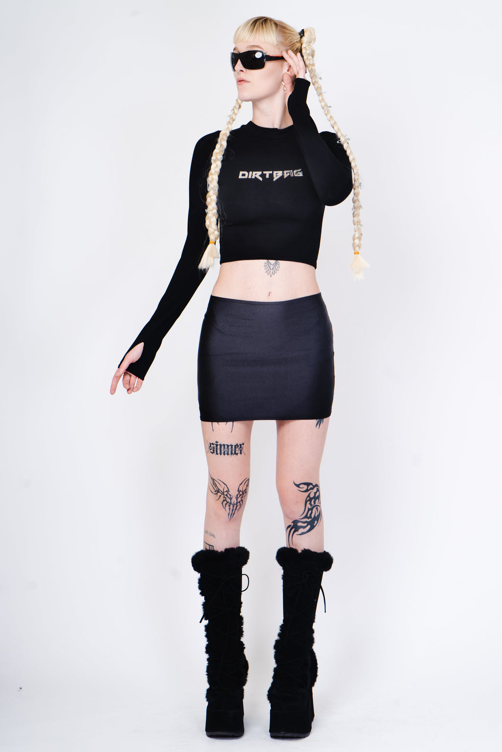 Black mini skirt with white tribal pattern.
