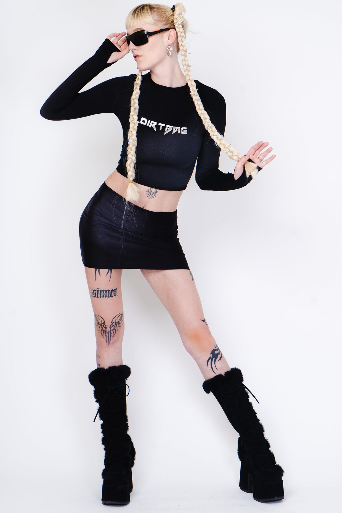 Black mini skirt with white tribal pattern.
