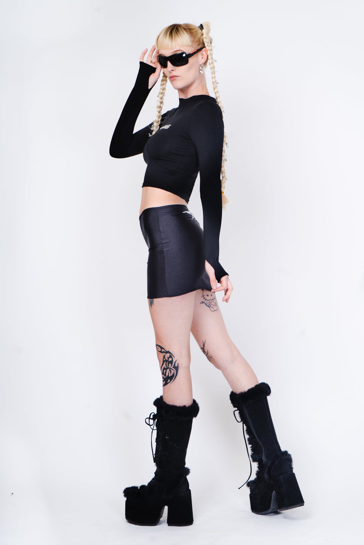 Black mini skirt with white tribal pattern.