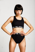 Black crop top with a glichty elastic band.