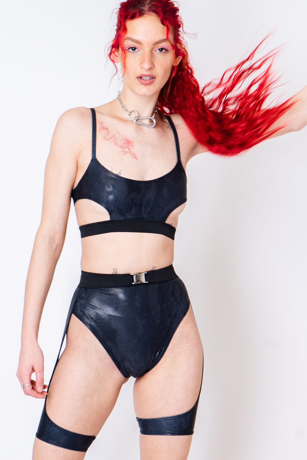Black snake print panties with garter belt.