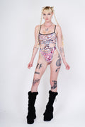 See through mesh layered bodysuit with daring cutouts for festivals.