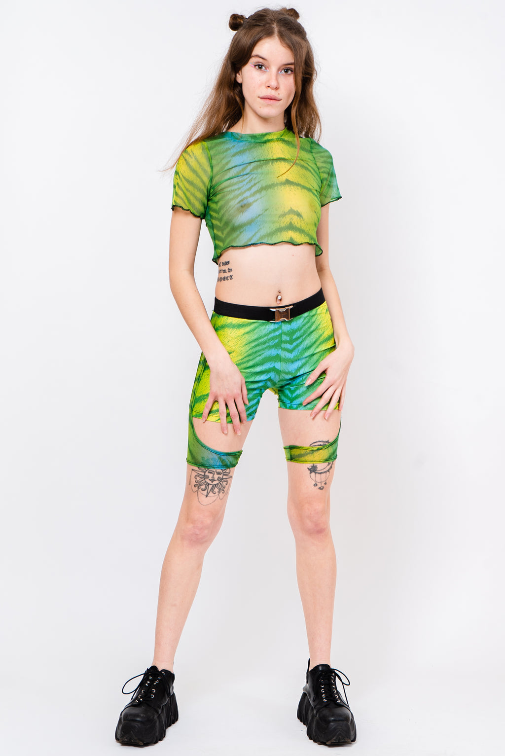 Neon green and black layered shorts.